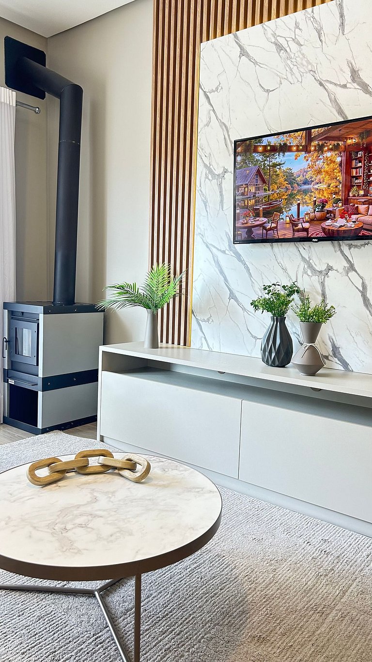 Belíssimo Apto com lareira e piscina aquecida!