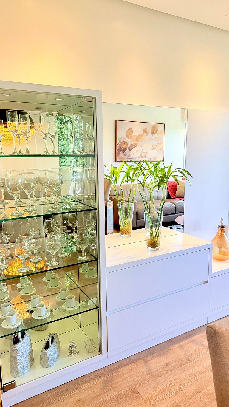 2 Suítes • Vista Sunset • 5min Centro