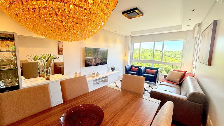 2 Suítes • Vista Sunset • 5min Centro