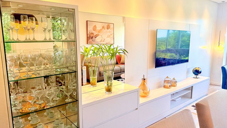 2 Suítes • Vista Sunset • 5min Centro