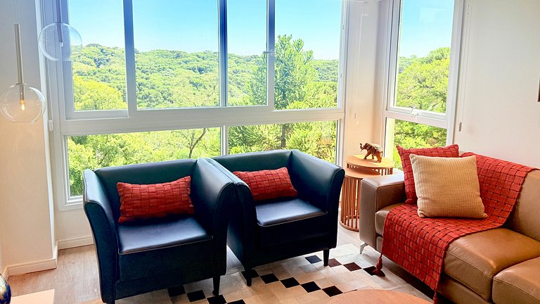 2 Suítes • Vista Sunset • 5min Centro