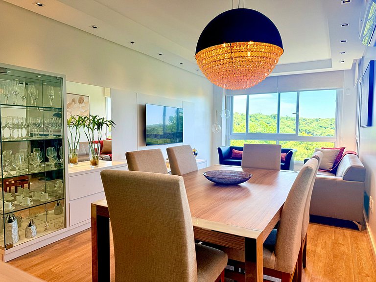 2 Suítes • Vista Sunset • 5min Centro