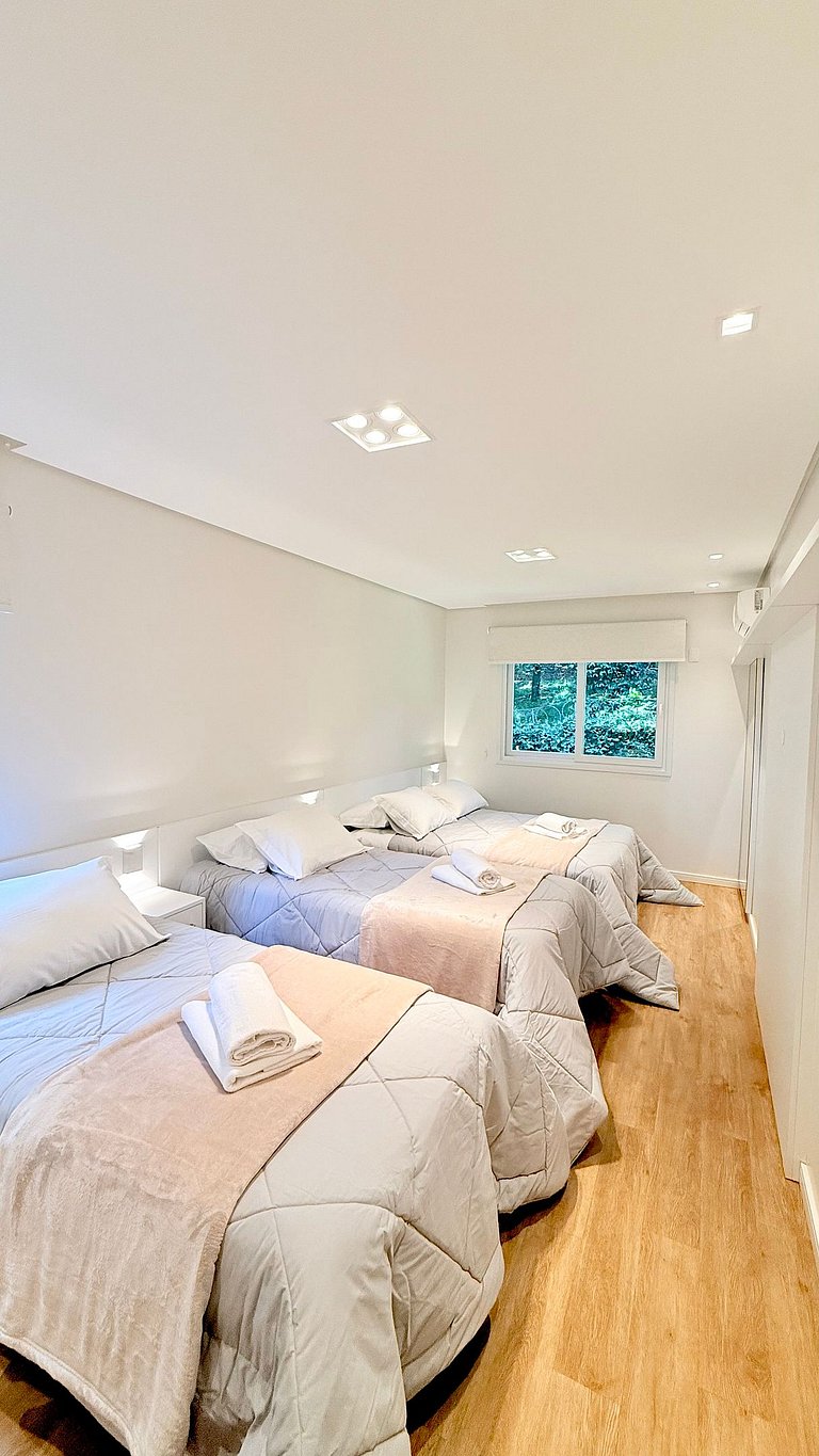 2 Suítes • Vista Sunset • 5min Centro