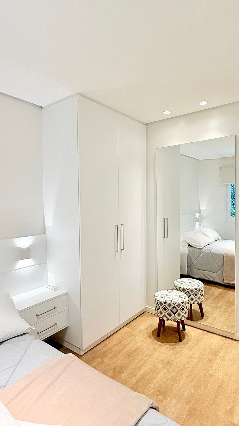 2 Suítes • Vista Sunset • 5min Centro