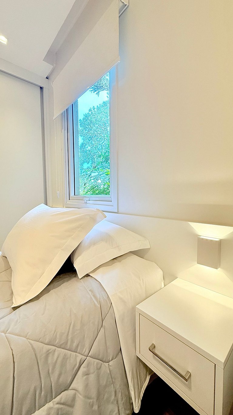 2 Suítes • Vista Sunset • 5min Centro