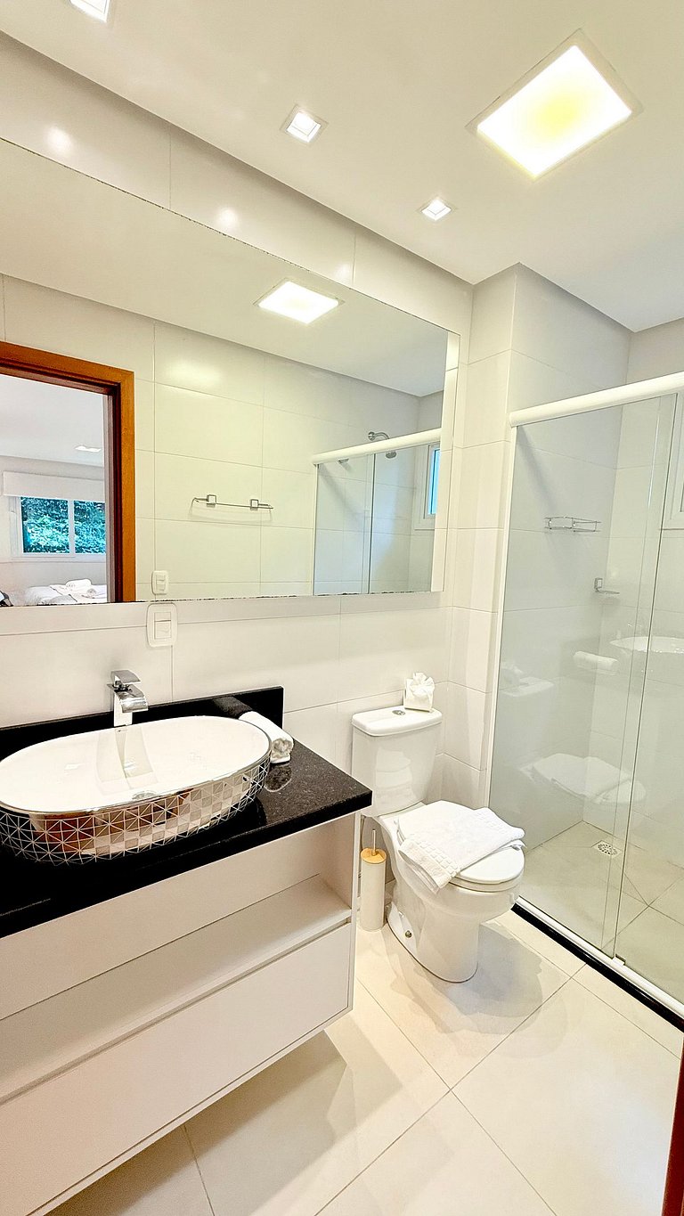 2 Suítes • Vista Sunset • 5min Centro